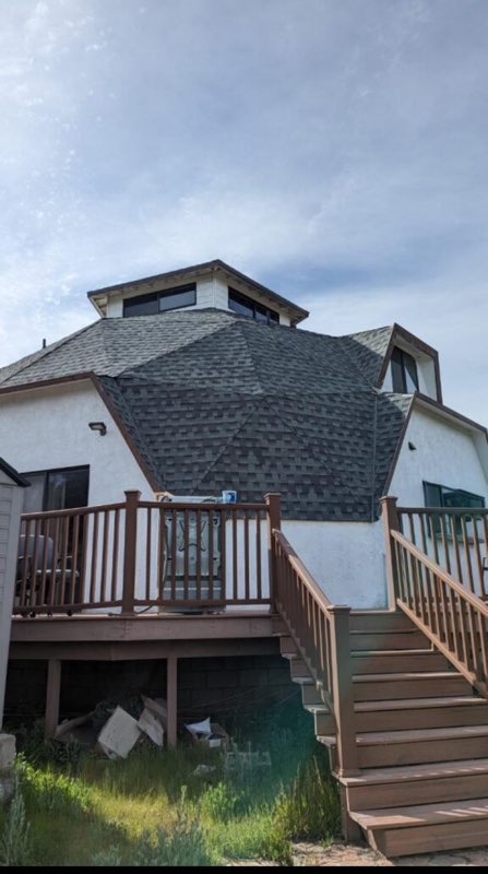 Completed architectural shingle roof on a multi-level home